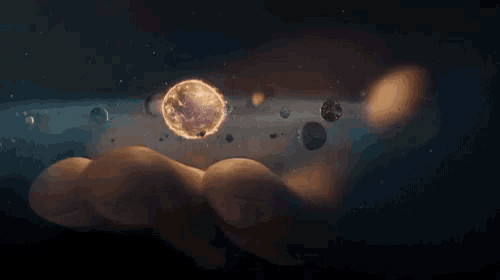 a person is holding a planet in their hand surrounded by planets