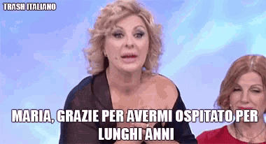 a woman says maria grazie per avermi ospitato per lunghi anni on a television show