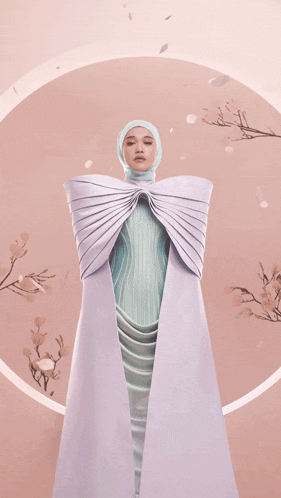 a woman wearing a hijab and a long purple dress with aura written on the bottom