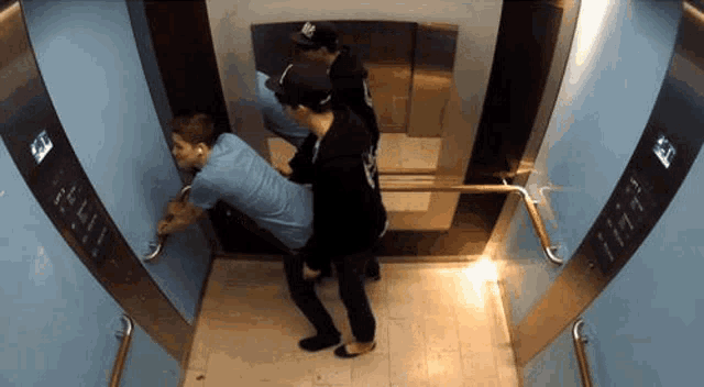 Hungarian Caught Becoming Men In Elevator GIF - Hungarian Caught Becoming Men In Elevator Hump GIFs