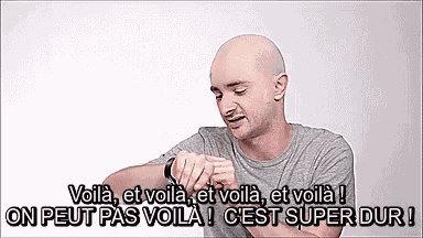 a bald man is looking at his watch with the words voila et voila et voila et voila ! on peut pas voila !