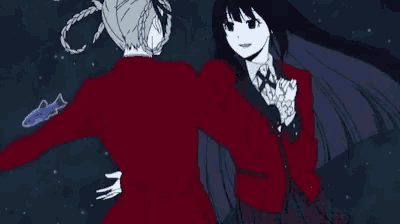 a girl in a red jacket is holding a man 's hand in a dark room with fish in the background .