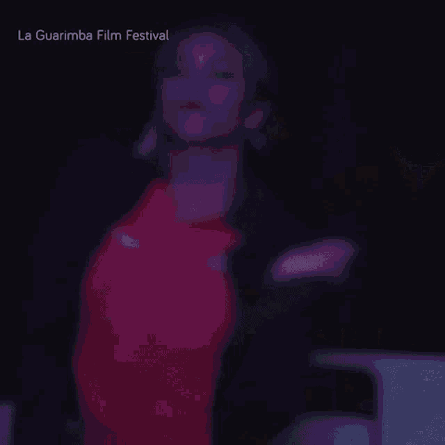 a blurred image of a woman with the words la guarimba film festival on the bottom