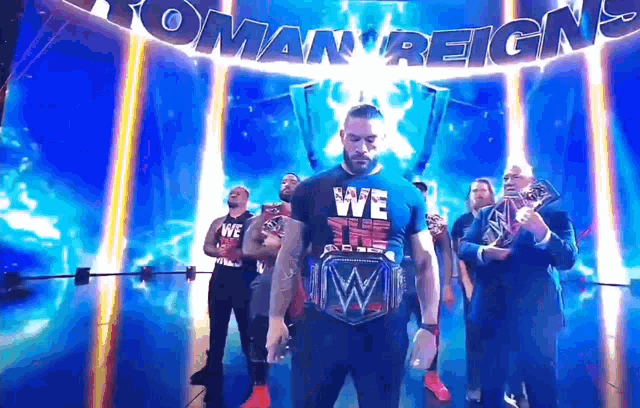roman reigns is wearing a t-shirt that says we the ones