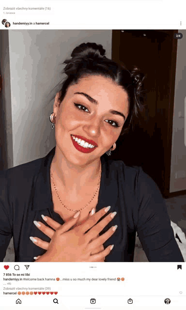 a picture of a woman with her hands on her chest is on a facebook page