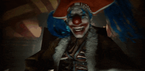 a scary clown with blue hair and a red nose