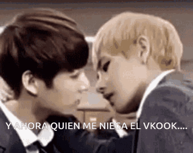 two men are kissing with the words y ahora quien me niega el vkook written on the bottom