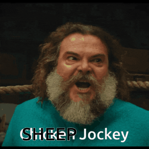 a man with a beard is wearing a blue shirt with the word jockey on it