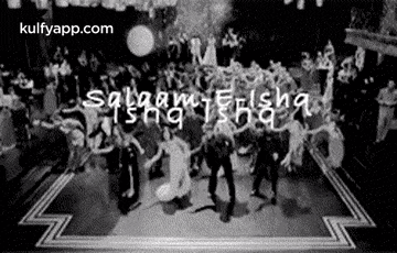 a black and white photo of a crowd of people dancing in a room .