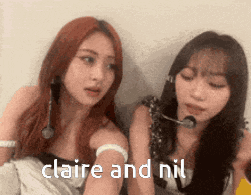 two women are sitting next to each other with the words " claire and nil " written on the bottom