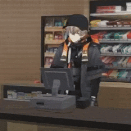 a man wearing a mask and goggles is standing behind a counter in a store