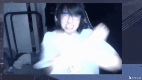 a blurry picture of a person 's face with the words outplayed on the bottom right