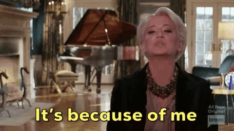 a woman says " it 's because of me " in a living room