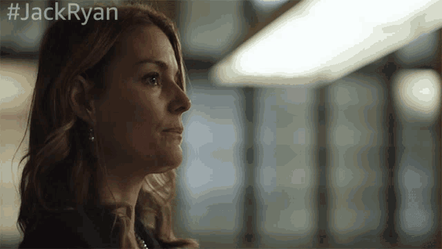 a close up of a woman 's face with the hashtag jackryan