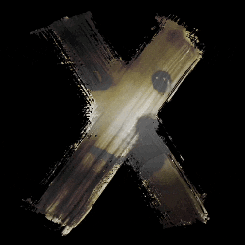 the letter x is painted on a black background with a brush stroke