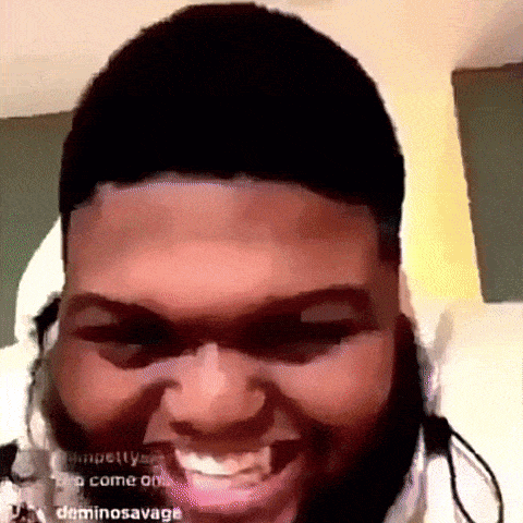 a close up of a man 's face with a caption that says " come on deminosavage "