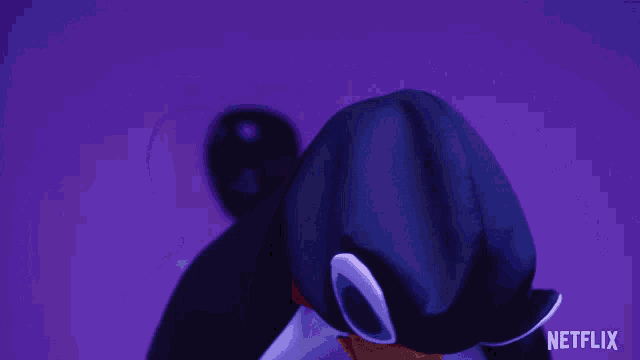 a penguin costume with a netflix logo on the bottom