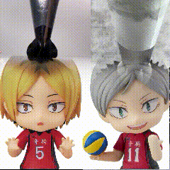 a doll with the number 5 on it stands next to another doll with the number 11 on it