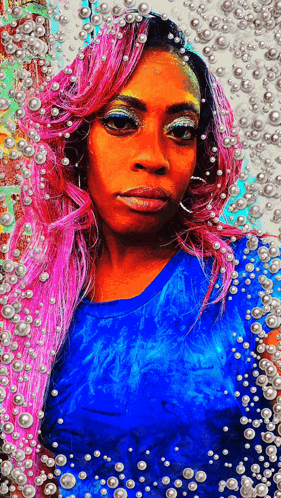 a woman with pink hair and pearls around her