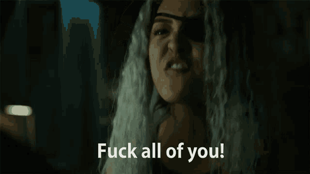 a close up of a woman with the words " fuck all of you " above her