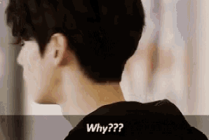 a close up of a man 's neck with the words `` why ? '' written on the bottom .
