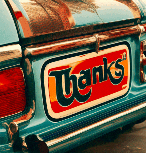 the back of a blue car with a red and white sign that says thanks