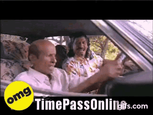 a man driving a car next to a timepassonline.com sticker