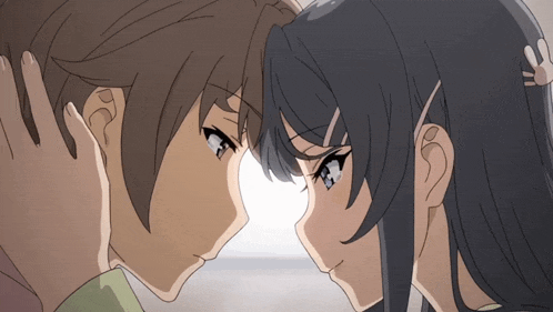 a boy and a girl looking at each other with their eyes closed
