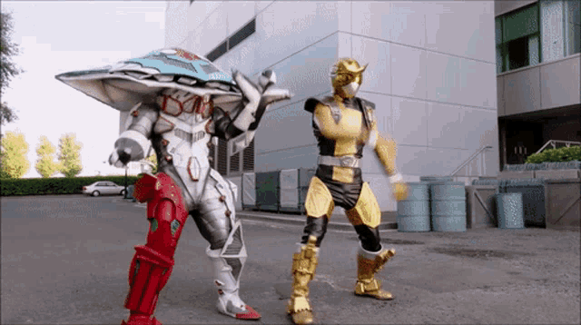 a couple of cartoon characters are standing in front of a building