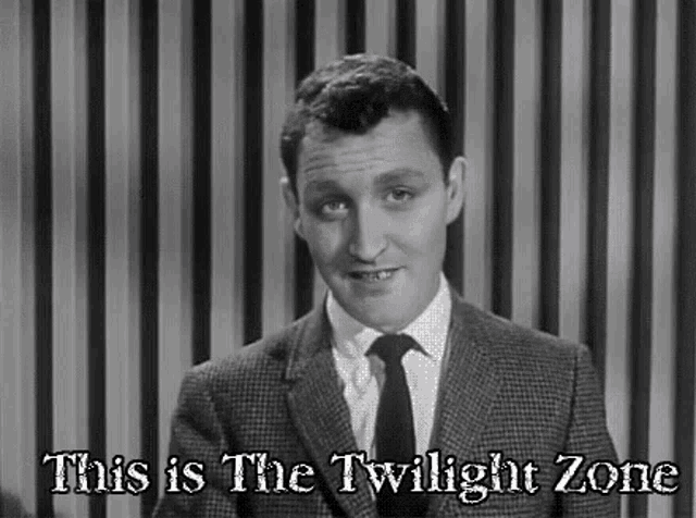 a man in a suit and tie is standing in front of a striped curtain and says `` this is the twilight zone '' .