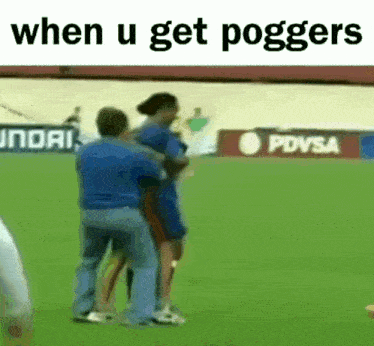 a man and a woman are standing on a soccer field with the caption when u get poggers .
