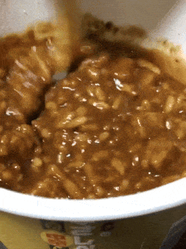 a close up of a bowl of oatmeal with a mcdonald 's logo