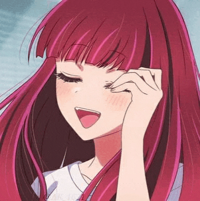 a close up of a girl with long red hair and a white shirt .