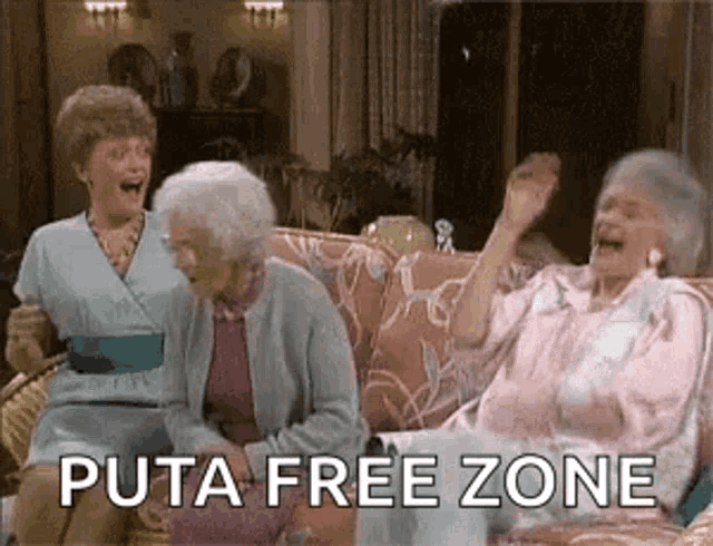 three elderly women are sitting on a couch laughing and talking .