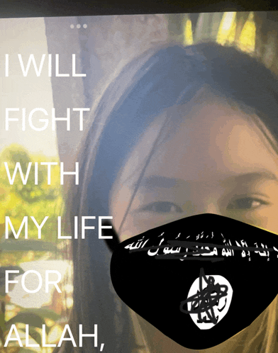 a girl wearing a mask with the words i will fight with my life for allah