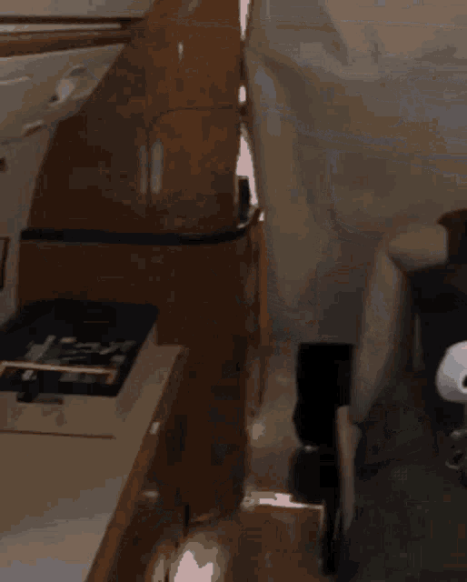 a person laying on a bed next to an air exit