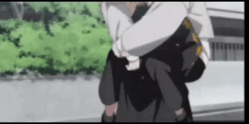 a man is carrying another man on his back in a blurry anime scene .