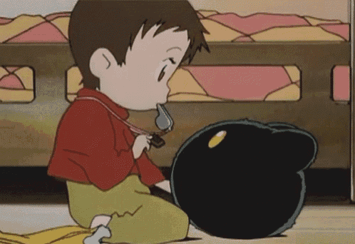 a little boy is playing with a stuffed animal