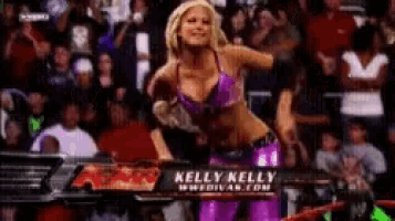 a woman in a wrestling ring with kelly kelly written on the bottom
