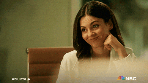 a picture of a woman with #suitsla written on it
