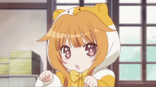 a girl with orange hair is wearing a cat hat