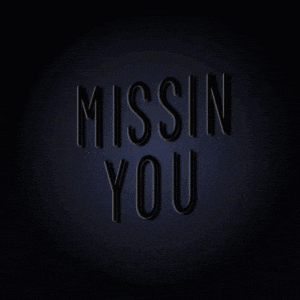 a neon sign that says missin you on a black background
