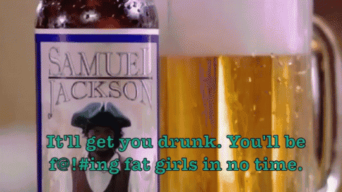 a bottle of samuel jackson beer sits next to a full beer mug