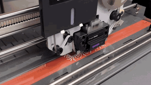 a machine has a purple label that says spongelo on it