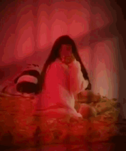 a blurred image of a woman with the words only horny written in white