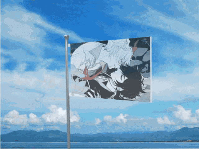 a flag with a picture of a man and woman on it is flying in the wind