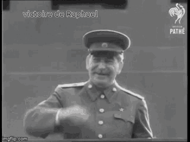 a man in a military uniform is giving a speech with the words victoire de raphael above him
