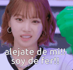 a close up of a woman 's face with the words alejate de mi soy de fer written below her