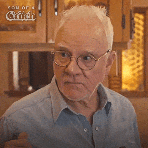 an older man wearing glasses and a blue shirt is shown in a son of a grifch advertisement