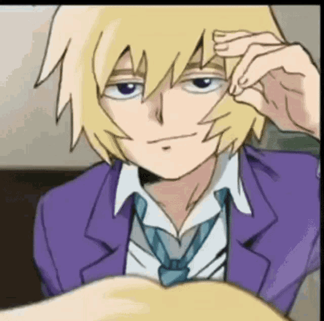 a cartoon character with blonde hair and a purple jacket and tie is looking at the camera .
